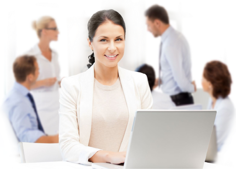 Woman using laptop in meeting