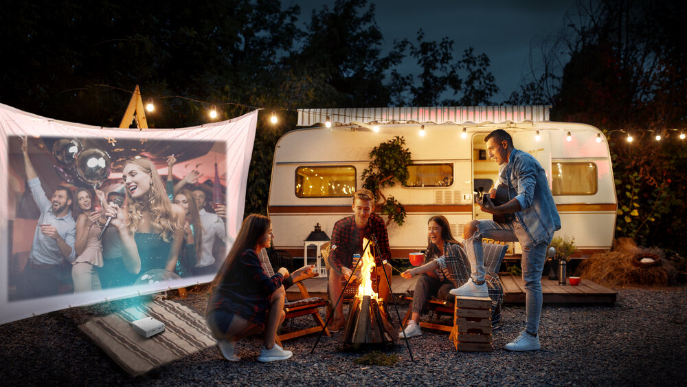 Get an Outdoor Mini Projector to enjoy time with friends.